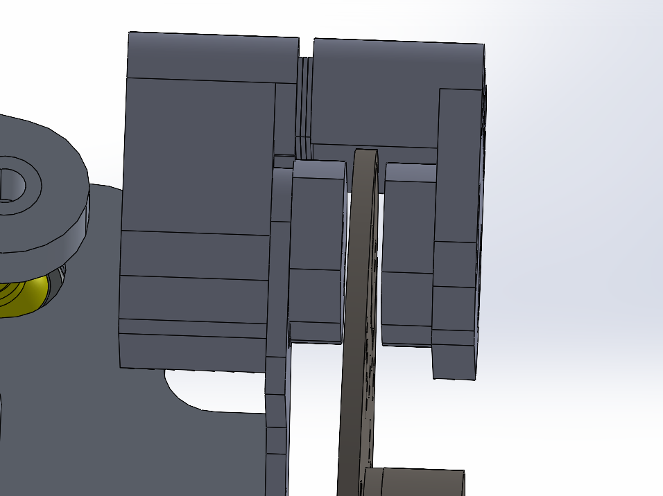 Close-up showing the rotor centred between the brake pads